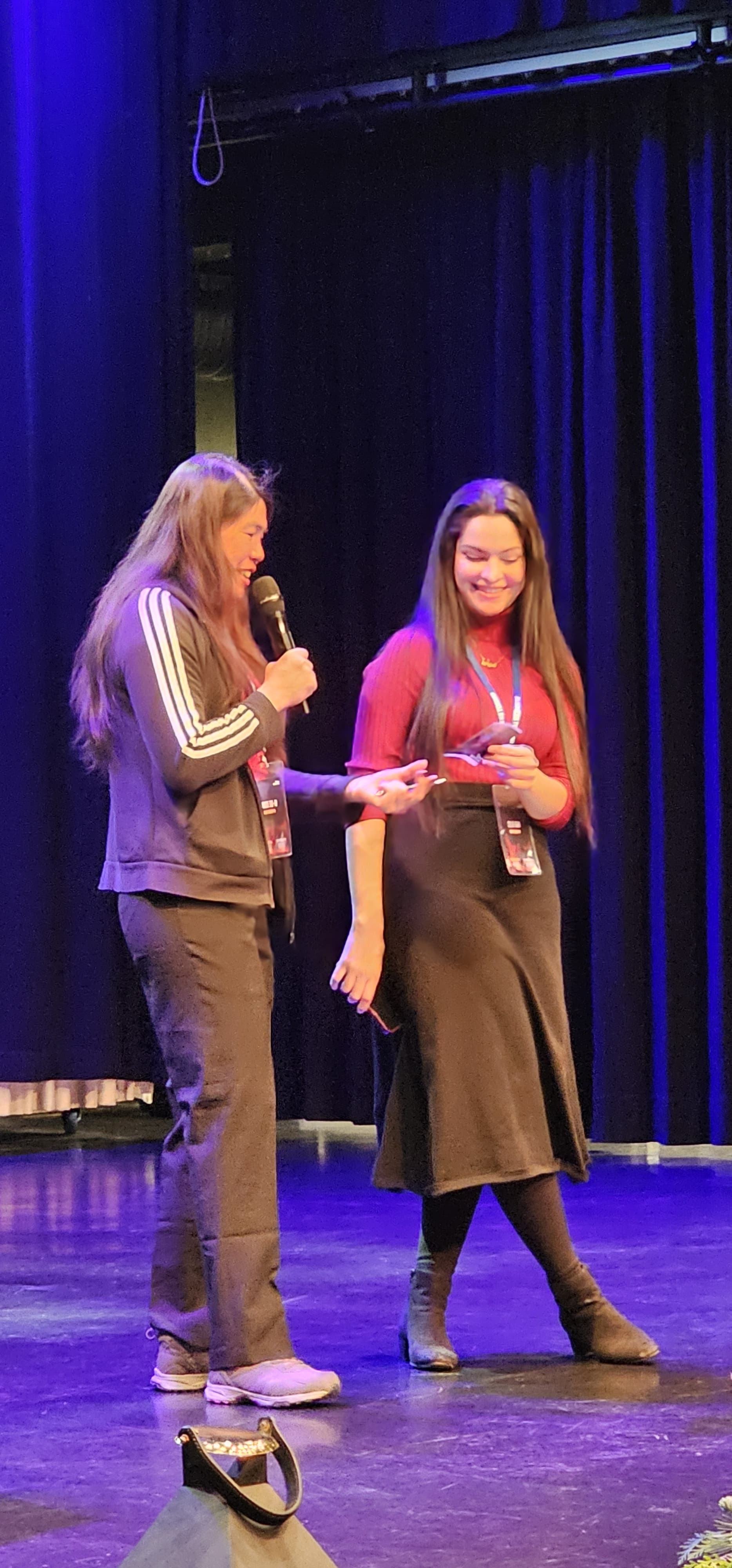 Presenting workshop findings on stage to the wider group